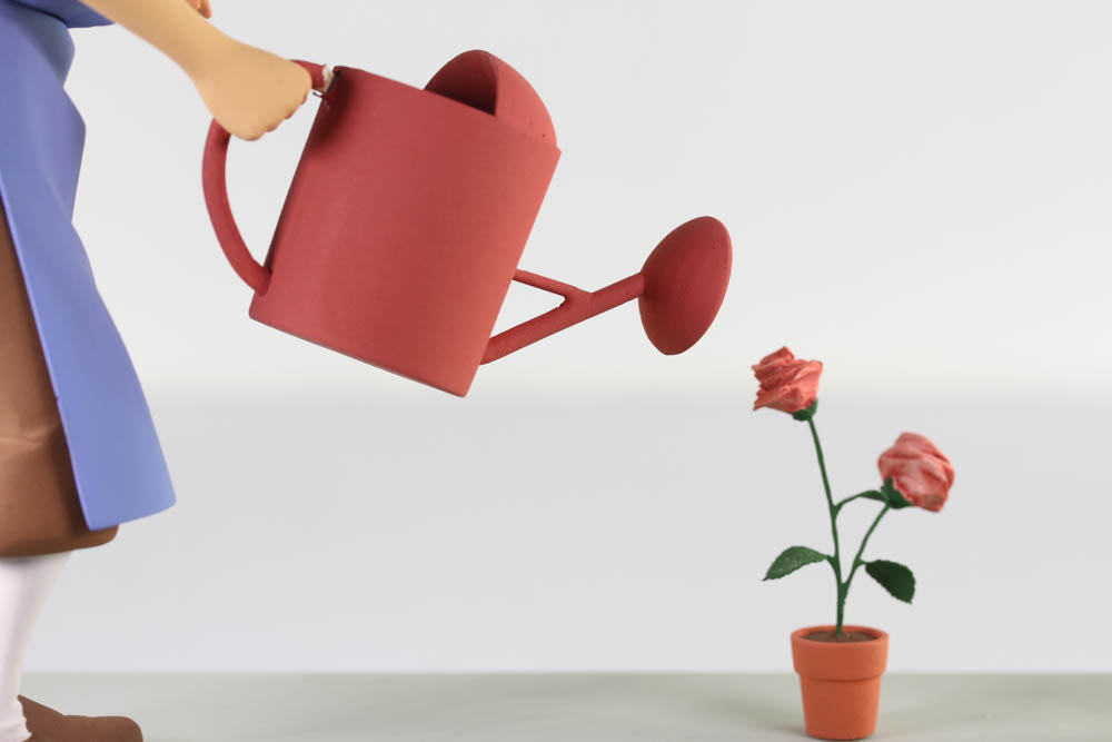 Tintin statuette: Character watering roses with red can, from Moulinsart Privilege Collection, limited edition hand-painted figurine