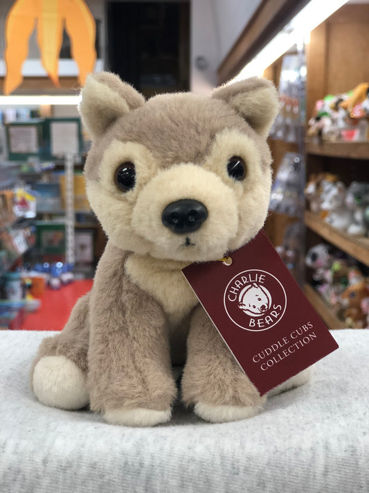 Soft, plush Charlie Bears Cuddle Cub Wolf toy with tag, perfect for babies, displayed in toy store