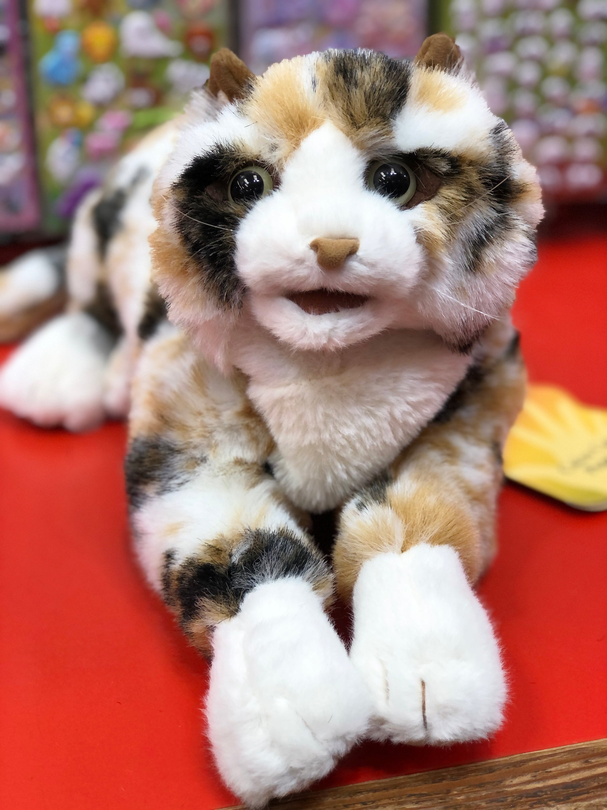 Plush toy hand puppet cat with tortoiseshell pattern by Folkmanis 
