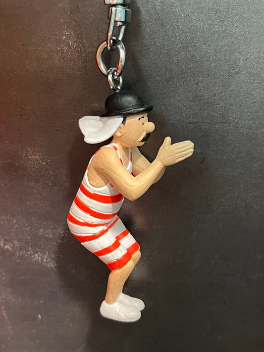 Thomson Tintin keychain figure in red-striped bathing costume, bowler hat, and mustache, ready to dive, 5.5cm mini collectible