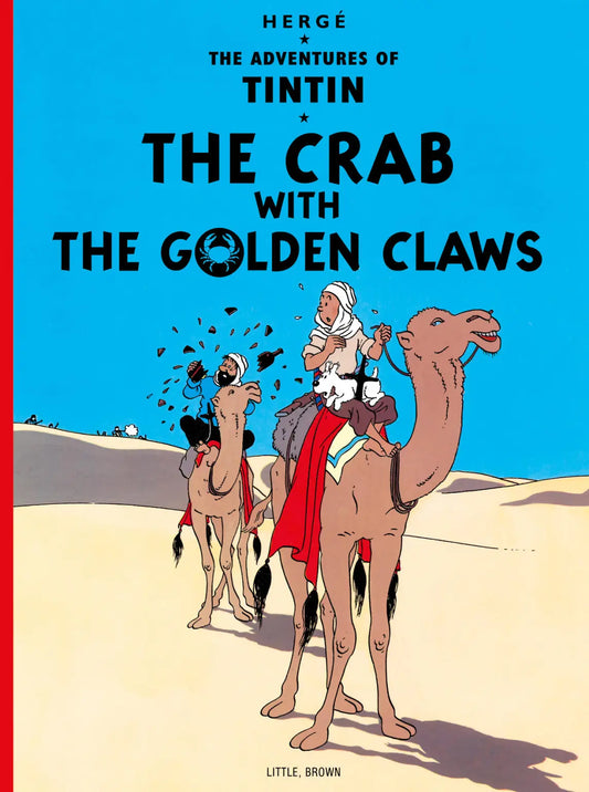 Front cover of 'The Adventures of Tintin: The Crab with the Golden Claws' paperback book. Features the first appearance of Captain Haddock. Published by Little, Brown and Company with classic Hergé illustration.