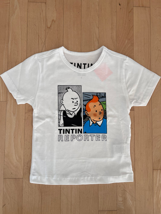 White kids' Tintin Reporter t-shirt with cartoon duo print, showing displeased and astonished expressions