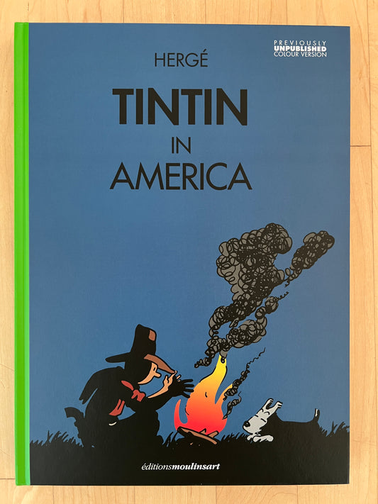 Book cover of "Tintin in America" by Hergé, showing a campfire scene with silhouetted figures. Previously unpublished color version.