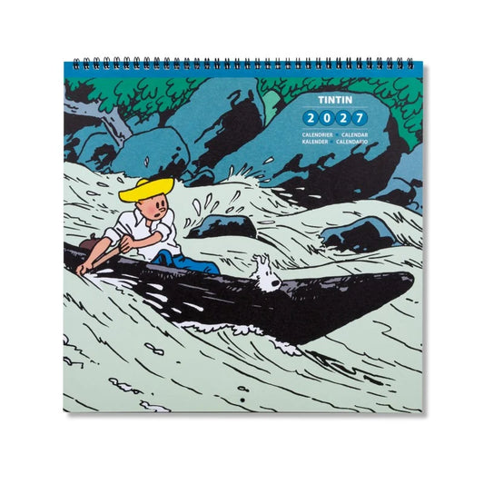 Official cover of the Tintin Wall Calendar 2027 featuring Tintin and Snowy navigating a canoe through rushing white-water river rapids from The Broken Ear.