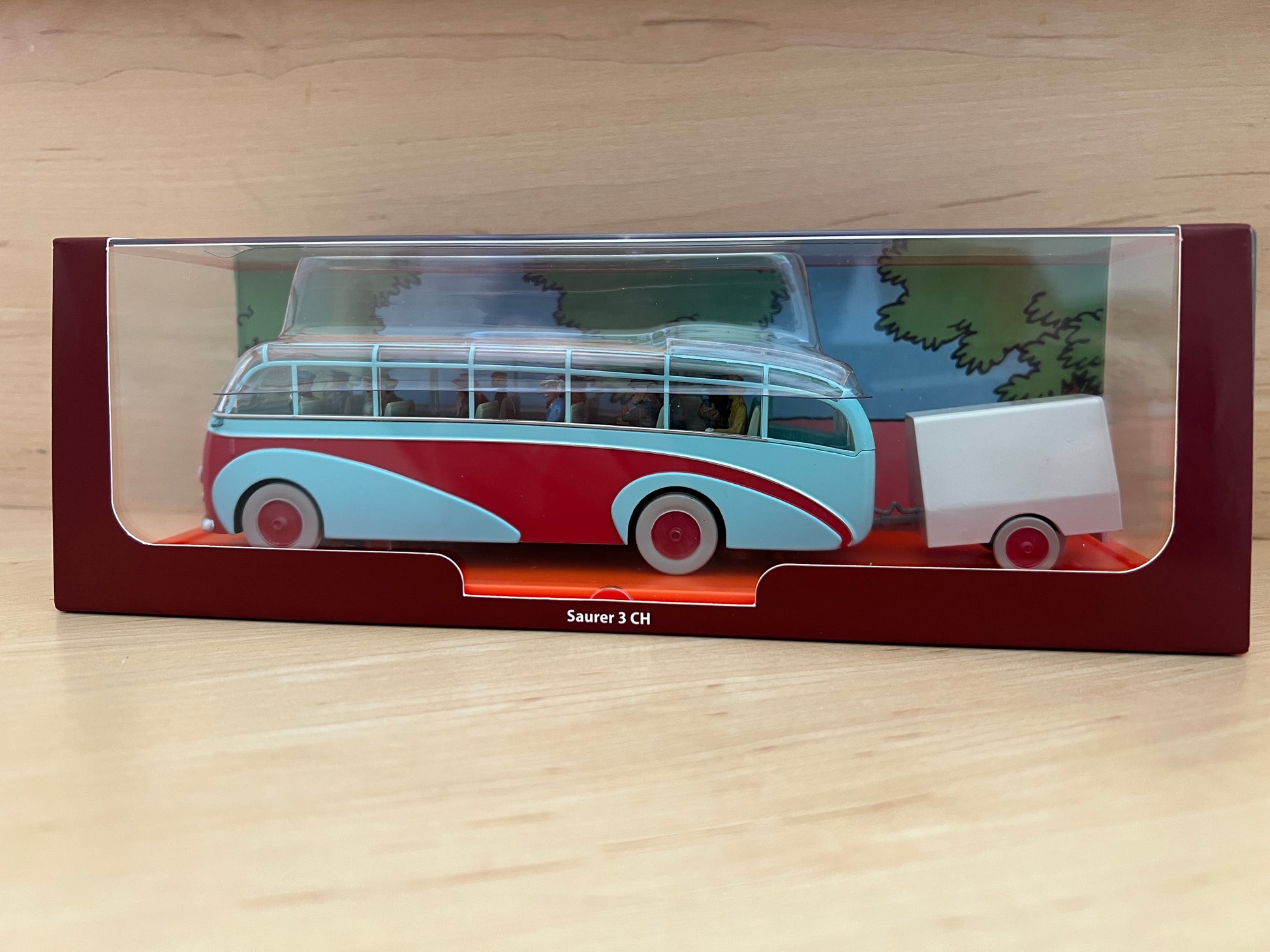 1/43 scale die-cast model of the blue and white Swissair bus and white trailer from Tintin's The Calculus Affair in display packaging. 