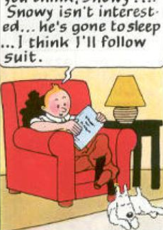 Tintin figurine sitting in a red armchair reading a book with Snowy the dog sleeping at his feet, collectible resin statue from The Broken Ear.