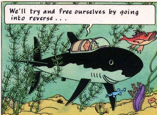 Comic book panel from Hergé's Tintin Red Rackham's Treasure, featuring the shark submarine underwater caught in seaweed with a speech bubble reading, "We'll try and free ourselves by going into reverse..."