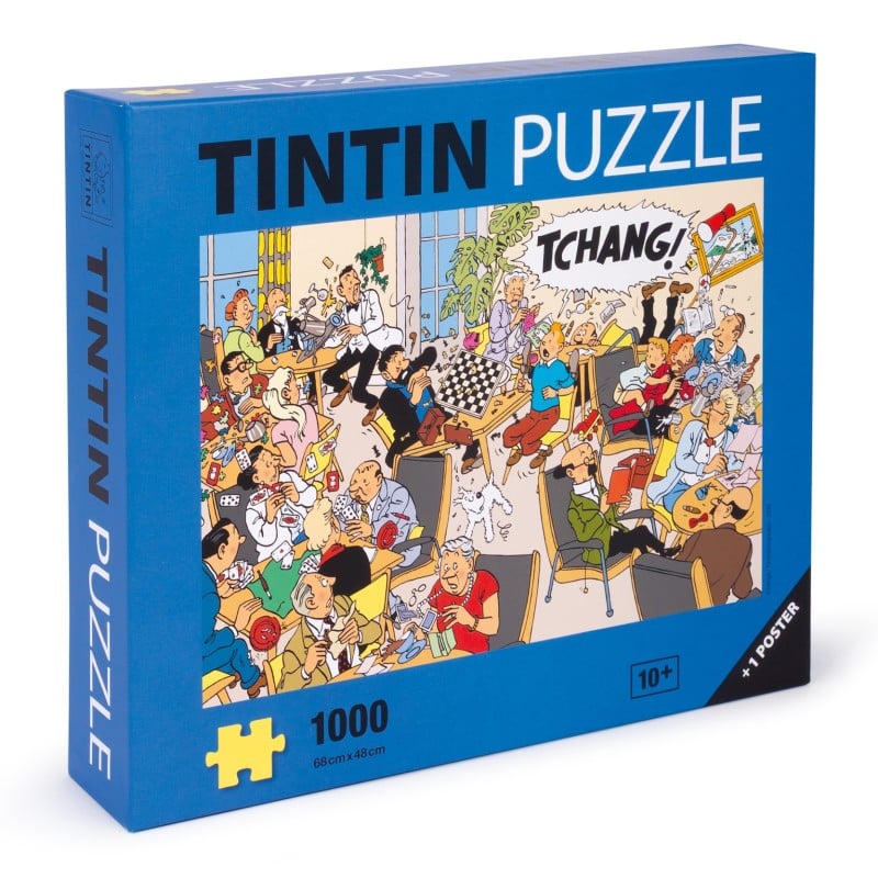 Blue Tintin 1000-piece puzzle box titled Tchang, featuring Hergé's classic illustration of absolute chaos in a Swiss alpine resort common room as a chessboard is knocked over.