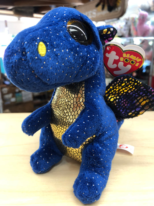 Adorable blue Ty Beanie Boo dragon plush with sparkly details and gold belly, featuring large eyes and colorful tag