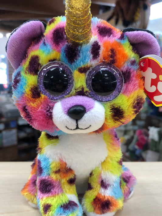 Colorful Ty Beanie Boo leopard plush with glittery eyes and golden horn, perfect for cuddling and collecting