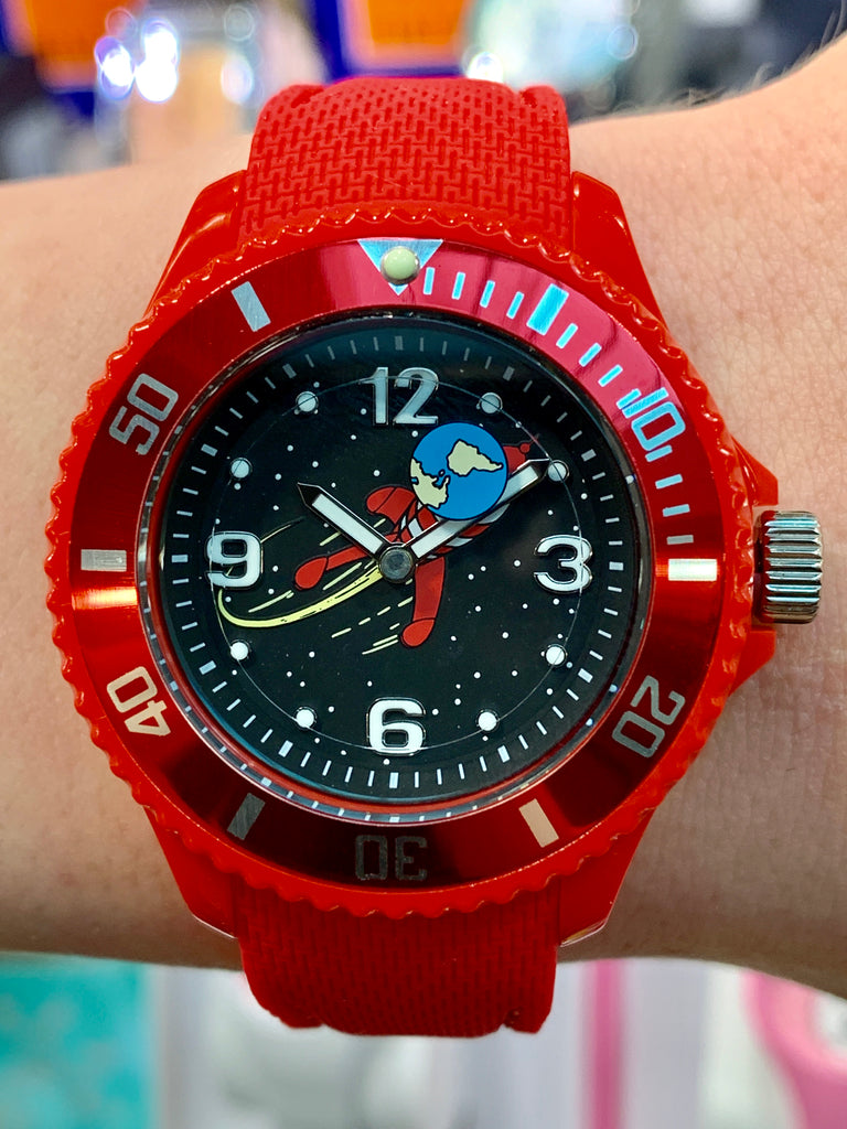 For your next space adventure, the Tintin Moon Rocket Watch has all the right stuff. Water and space resistant to 10 ATM. With glow in the dark hands and numbers, your watch will be readable in the cold darkness of space. A rotating timing bezel will help you keep track of your remaining air supply on space walks. 