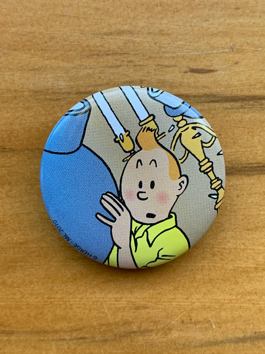 Tintin Hides Behind Blue Lotus Vase Button
