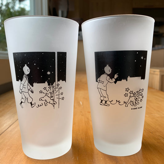 Tintin and Snowy frosted glasses with starry night scenes, showing dog walking into pole and staggering