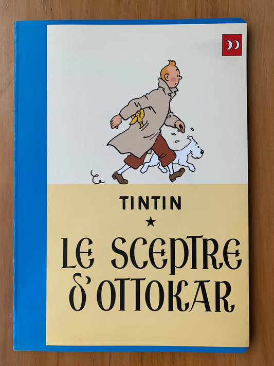 Tintin Le Sceptre d'Ottokar lined notebook cover featuring cartoon character and dog walking, blue spine, 48 pages
