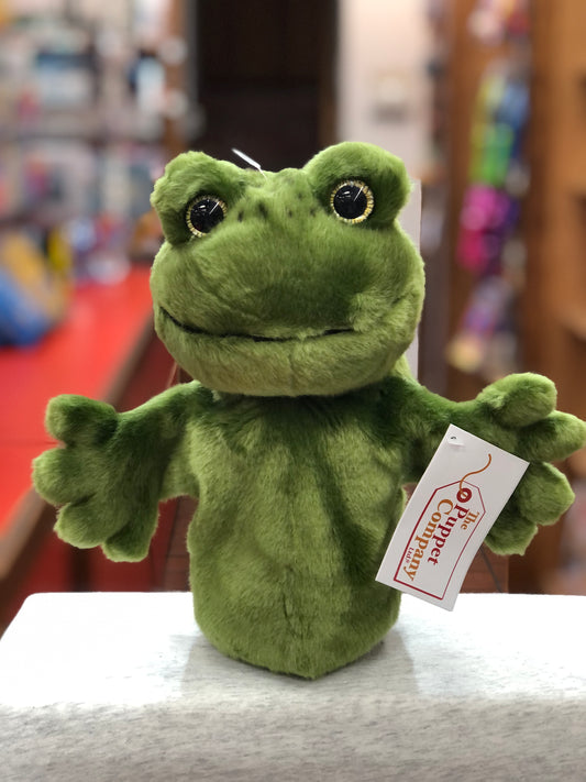 Cute green frog hand puppet from The Puppet Company's CarPets collection, with big eyes and soft plush fabric, on display