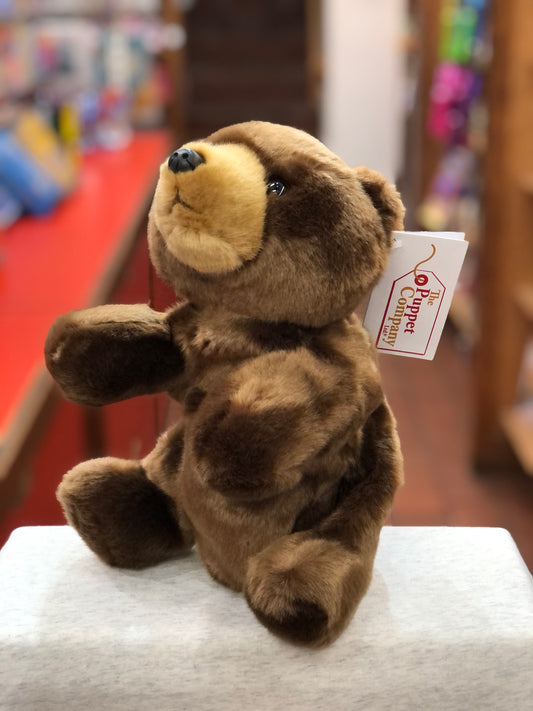Cuddly full-bodied bear puppet by The Puppet Company, soft brown plush toy with movable limbs and brand tag