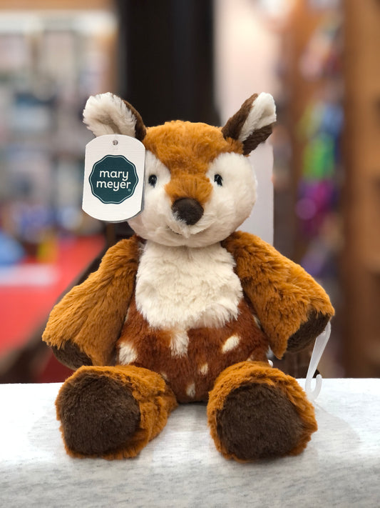 Soft, cuddly Mary Meyer Marshmallow Zoo fawn plush toy with tag, sitting on display in a store setting
