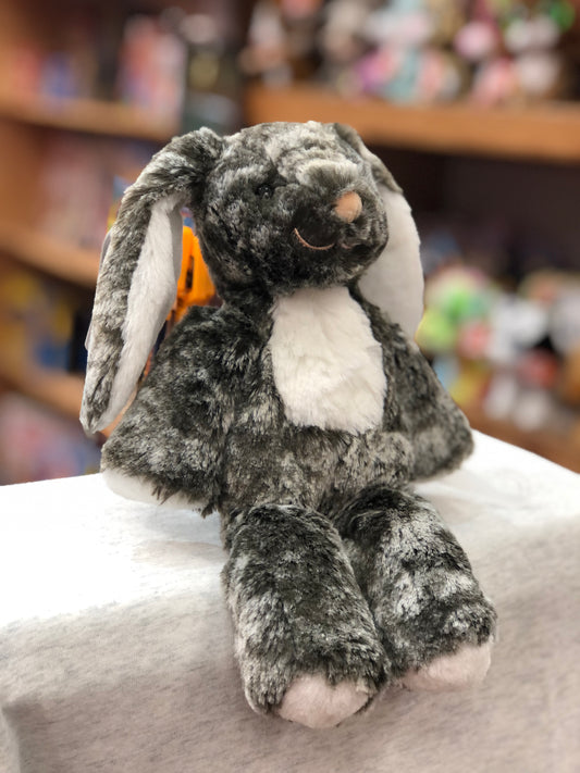 Soft gray Ringo Bunny plush toy from Mary Meyer Marshmallow Zoo, sitting on display with long floppy ears and white belly
