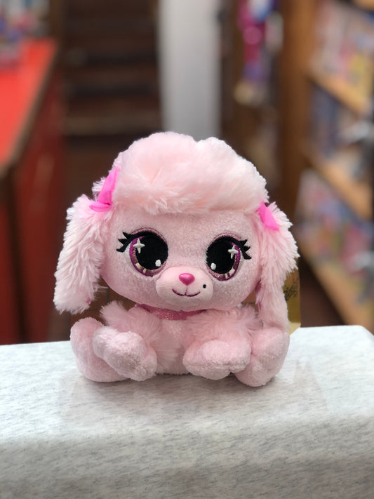 Gund P.Lushes Pinkie Monroe poodle plush toy with sparkly eyes, pink fur, and glitter collar, sitting on display
