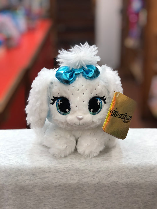 Gund P.Lushes Bianca Blings plush toy: white sparkly dog with teal bow and eyes, fluffy fur, gold tag, on white surface