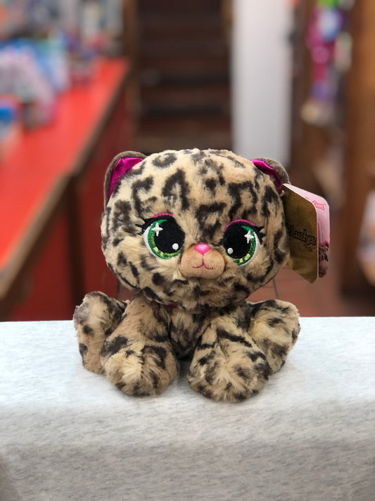 Gund P.Lushes Sadie Spotson plush leopard toy with pink ears, green eyes, and sparkly collar on display