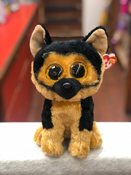 Ty Beanie Boo Spirit German Shepherd plush toy with large golden eyes, black and brown fur, sitting on display