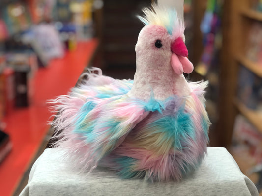 Pastel hen plush toy with colorful feathers in pink, blue, and yellow, featuring a bright pink beak and wattle