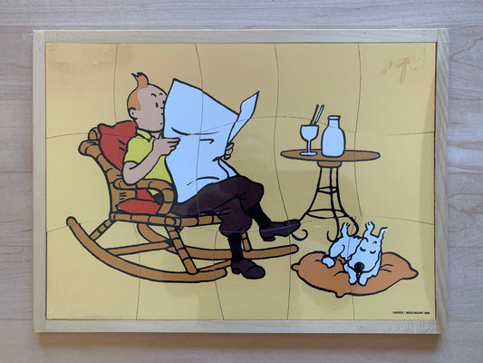 Tintin and Snowy wooden puzzle: Tintin reading in rocking chair, Snowy sleeping nearby, 15 pieces, shrink-wrapped