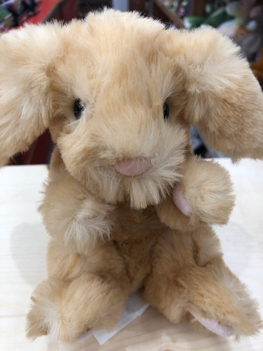 Adorable golden Douglas Lil' Handful bunny plush toy with soft fur and floppy ears, sitting upright on white surface