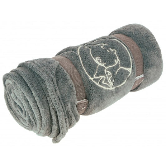 Soft grey Tintin fleece blanket rolled up, showing embroidered character design and straps for easy storage or travel