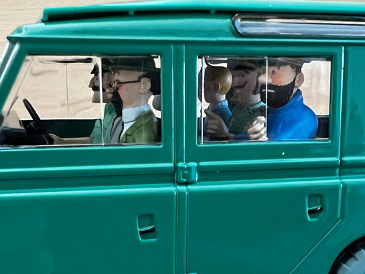 Tintin Land Rover model from "Land of the Picaros", 1/24 scale, teal green with characters visible through windows
