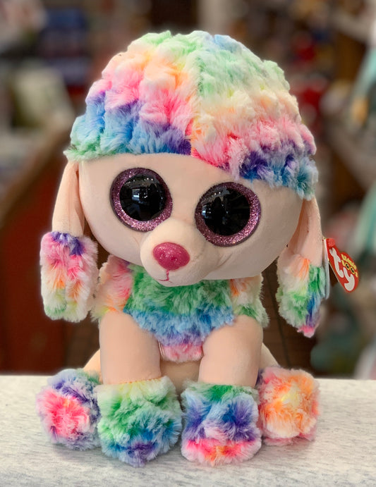 Ty Beanie Boo Rainbow Dog plush toy with colorful fur, large sparkly eyes, and pink nose, perfect for cuddling and collecting