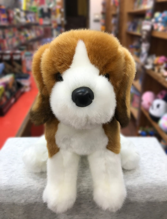 Lifelike Douglas Balthezar Beagle plush toy with tri-color coat and floppy ears, sitting in a toy store display