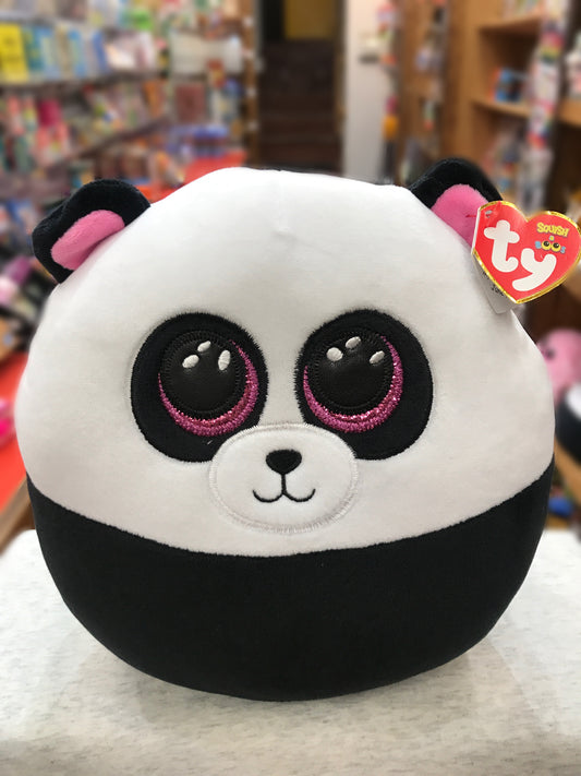 Cute Ty Squish-a-Boo panda plush with sparkly pink eyes, soft black and white fur, displayed in toy store