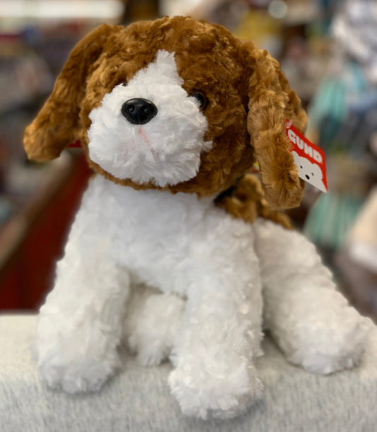 Gund russet beagle plush toy with white body and brown floppy ears, sitting on display in store