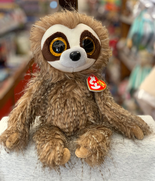 Adorable Ty Beanie Boo Sully sloth plush toy with large glittery eyes and soft brown fur, sitting on display in store