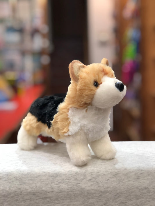 Adorable tri-color Corgi plush toy with realistic features, soft fur, and expressive eyes, perfect for cuddling and portable adventures