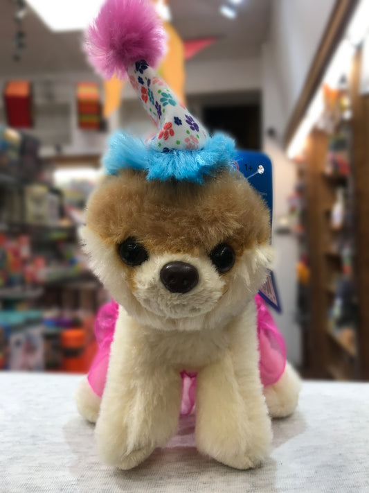 Gund Boo plush dog in pink tutu and colorful birthday hat with paw prints, perfect for celebrating special occasions