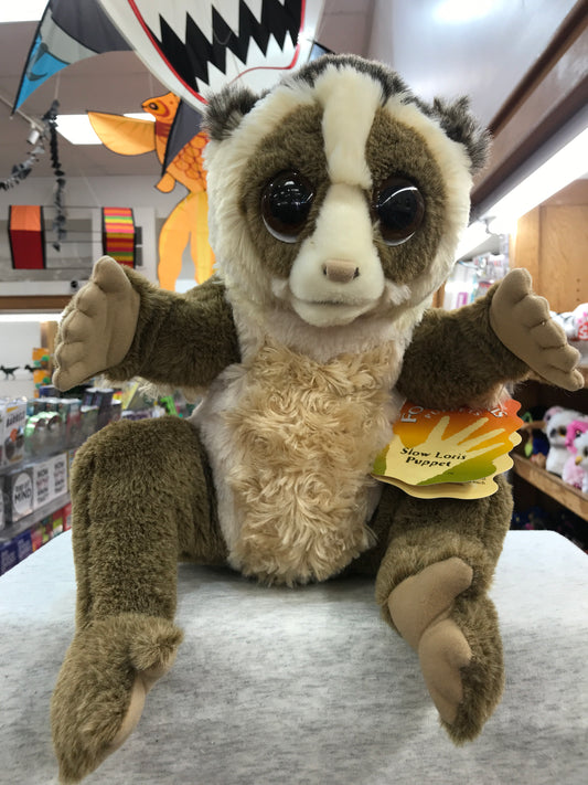 Adorable Folkmanis slow loris puppet with large eyes and movable limbs, perfect for conservation education and storytelling