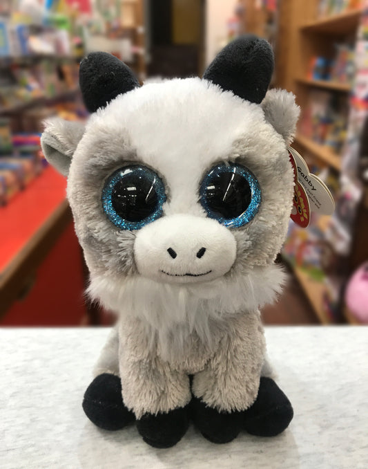 Ty Beanie Boo Gabby Goat plush toy with large blue glittery eyes, white and gray fur, sitting in a store display