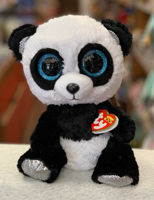 Adorable Ty Beanie Boo panda plush with large blue glittery eyes, soft black and white fur, and Ty heart tag