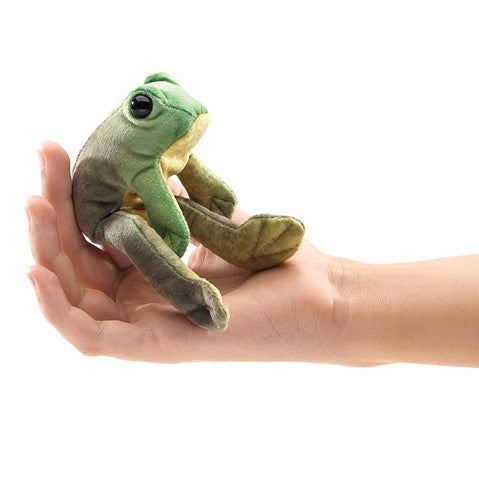 Folkmanis Mini Sitting Frog finger puppet, green plush toy sitting in an open palm, perfect for playful fun
