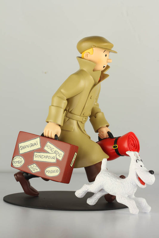 Tintin and Snowy figurine returning from adventure, carrying suitcase and bedroll, based on 1935 comic panel